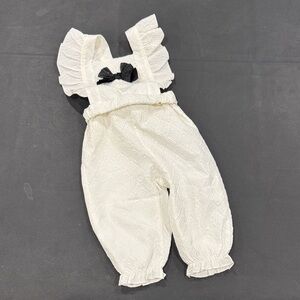 SHEIN Ivory Ruffle Jumpsuit with Black Bow